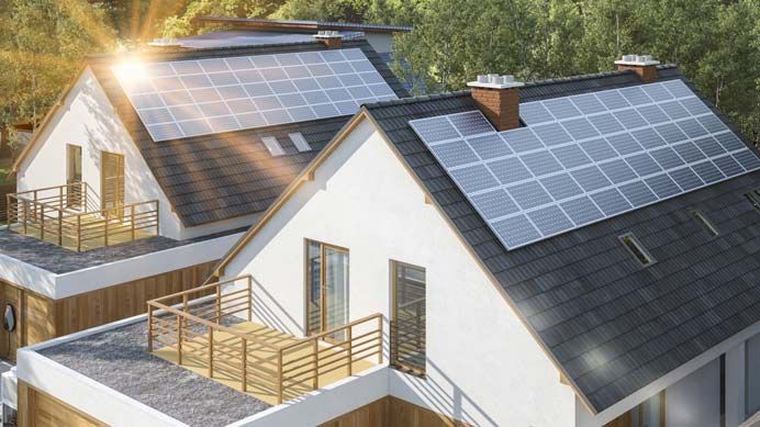 Illustration zweier Wohnhäuser mit Solarmodulen auf den Dächern